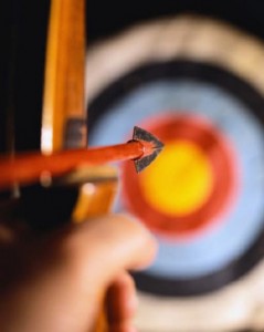 Bow with arrow aimed at target