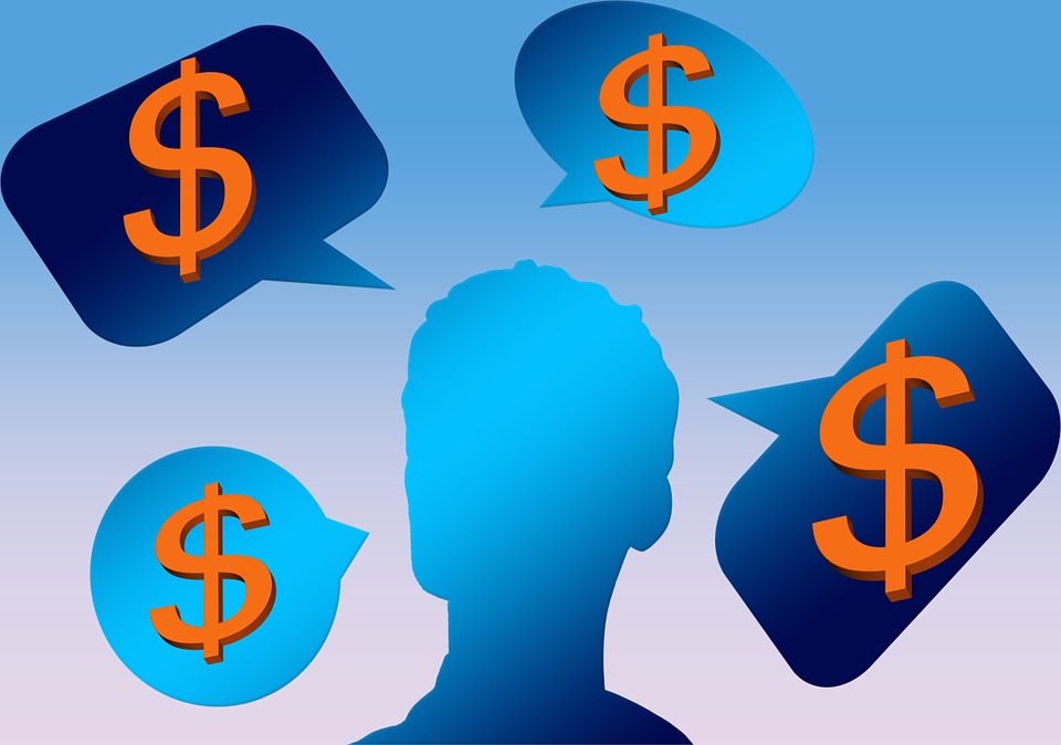 silhouette of man with dollar signs around head