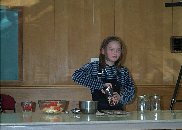 Girl demonstrating how to make food