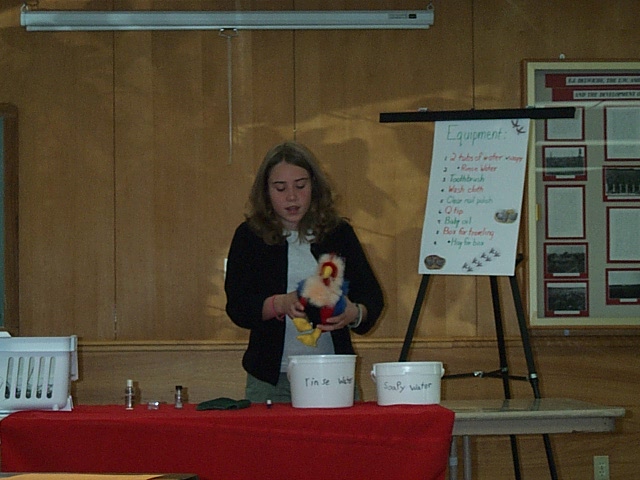 girl with stuffed chicken toy